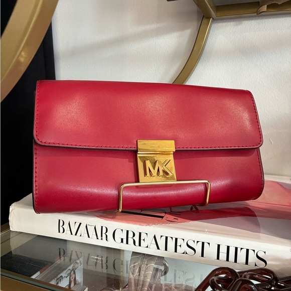 Michael Kors Handbags - Michael Kors red clutch with gold buckle detail